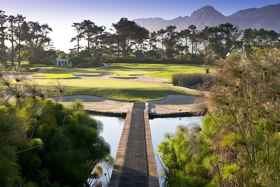 Private golf course with mountain views and waterways in Cape Town.