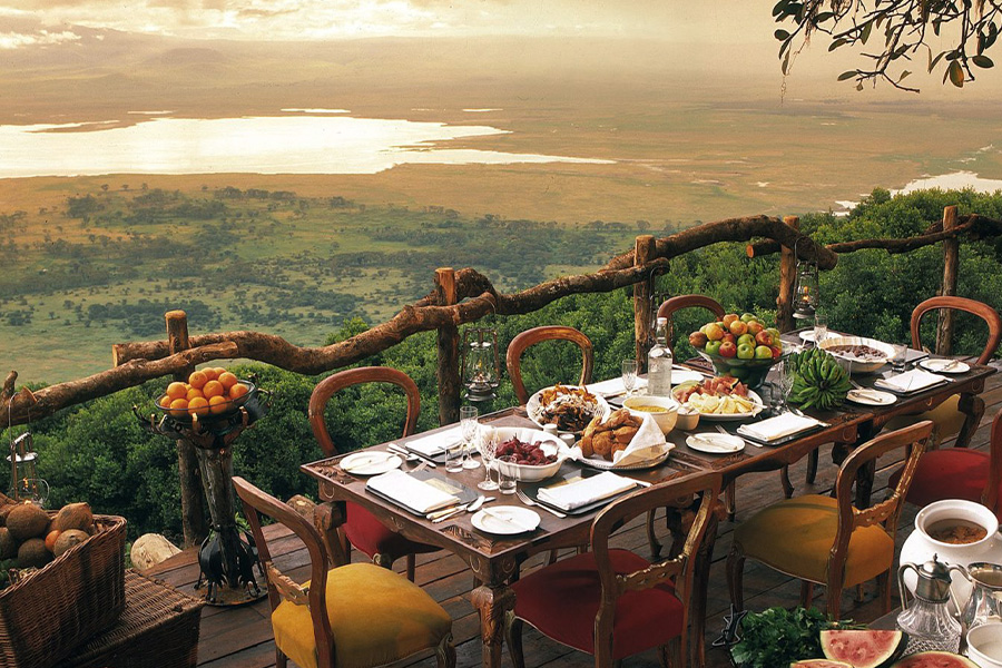 Fine dining cuisine with stunning view in Ngorongoro Conservation Area at luxury accommodation while on safari.