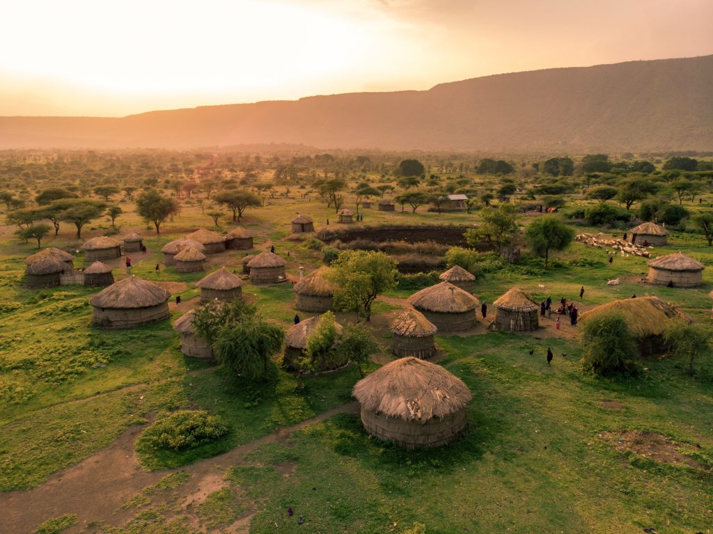Aerial,Drone,Shot.,Traditional,Masai,Village,At,Sunset,Time,Near