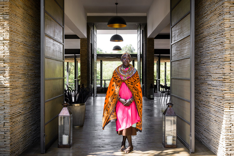 Luxury accommodation at Sanctuary Olonana Lodge with African dresses matron