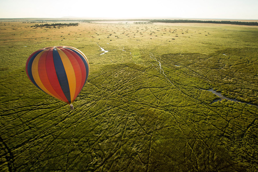 Aerial view of hot balloon ride over the plains of East Africa.
